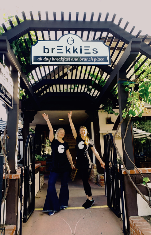 Wait staff welcoming you to Brekkies Restaurant for breakfast.